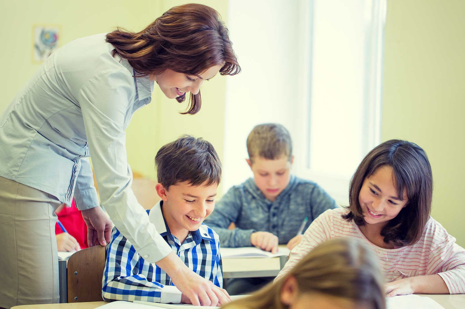 Teacher and kids in classroom