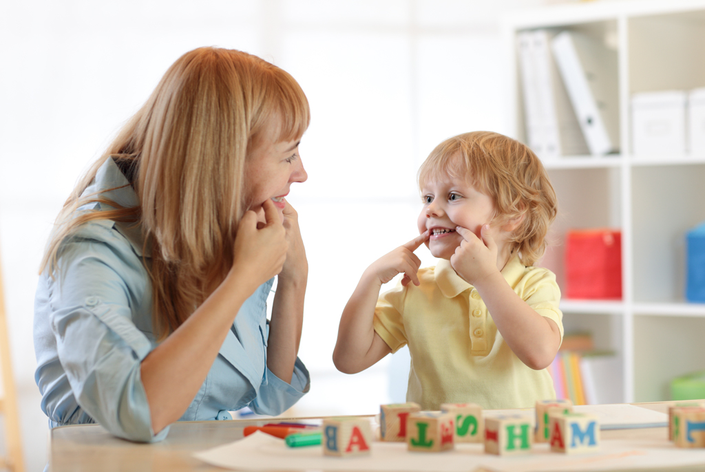 Speech therapist practicing vocal exercises